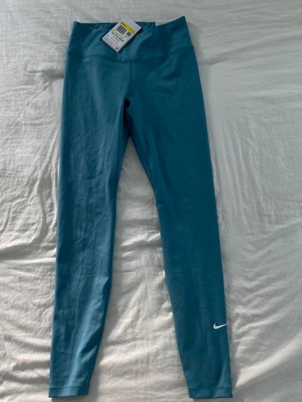 Nike blue leggings with pockets Size S NWT